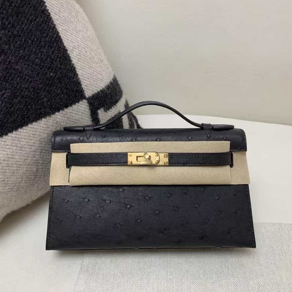 Hermès Kelly Pochette Ostrich Noir with Gold Hardware